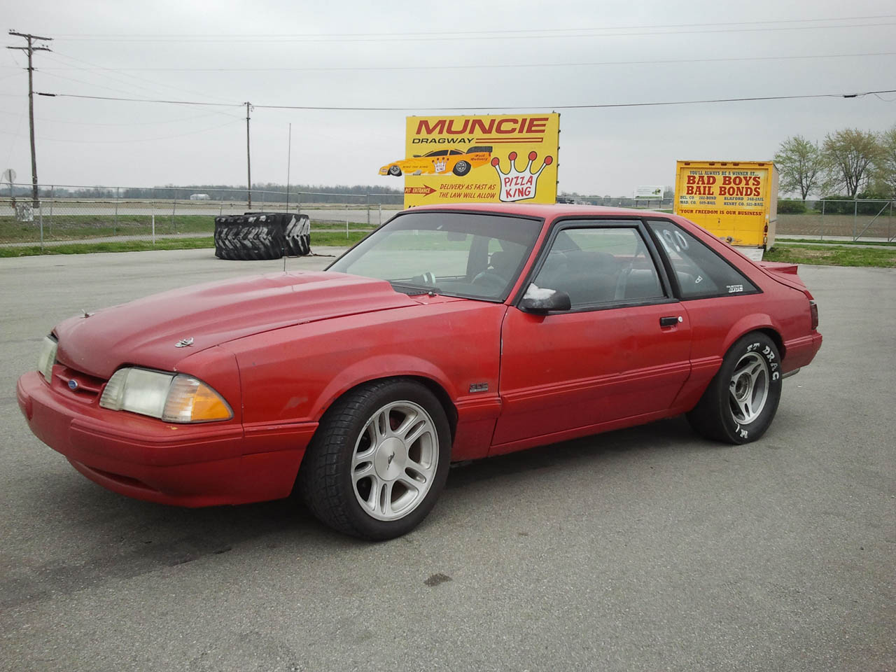 Red 1993 Ford Mustang LX 302