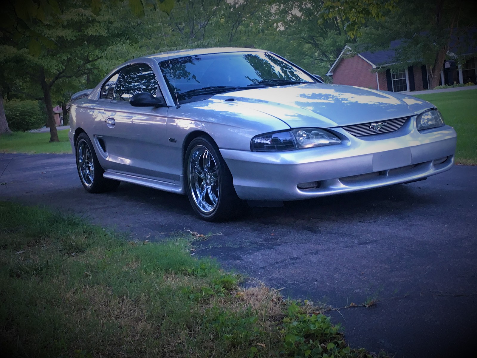 Metalic silver 1998 Ford Mustang GT