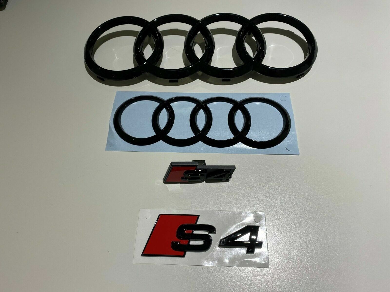 Audi S4 Rings Front Rear Emblems Glossy Black Genuine New