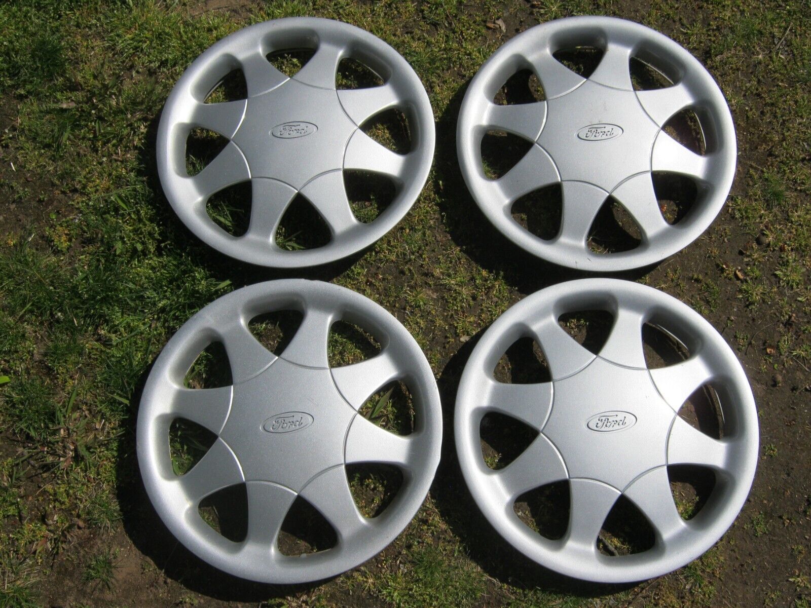 Factory original Ford Aspire 13 inch hubcaps wheel covers