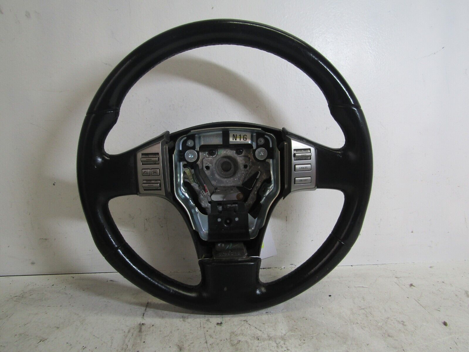 2004-2012 Nissan Titan Armada Black Leather Wrap Steering Wheel Radio Cruise