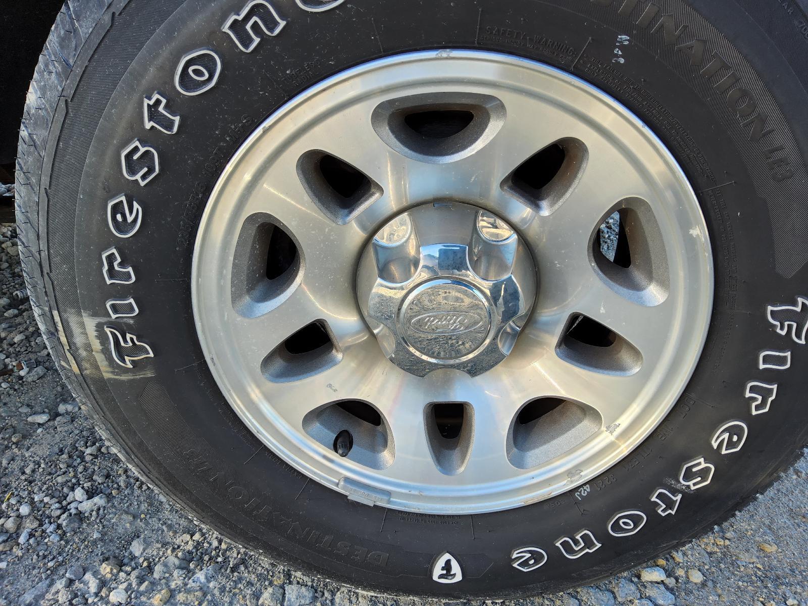 Used Wheel fits: 2011 Ford Ranger 15x7 aluminum 10 tear drop holes Grade C