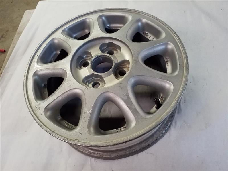 14x5-1/2 Alloy 9-Spoke Wheel | Fits 1993-1997 Geo Prizm