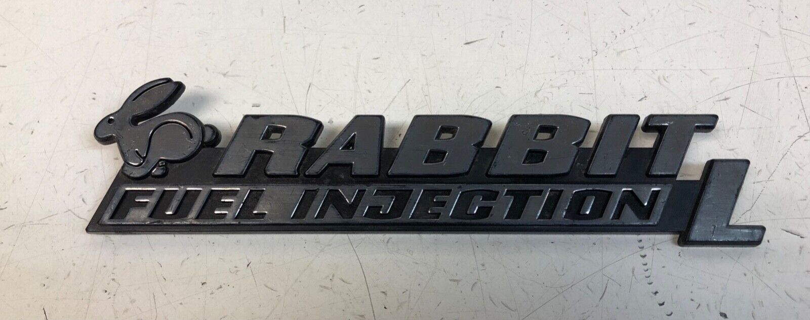 78-84 Volkswagen Rabbit Fuel Injection L Emblem Sign Nameplate Tailgate Oem