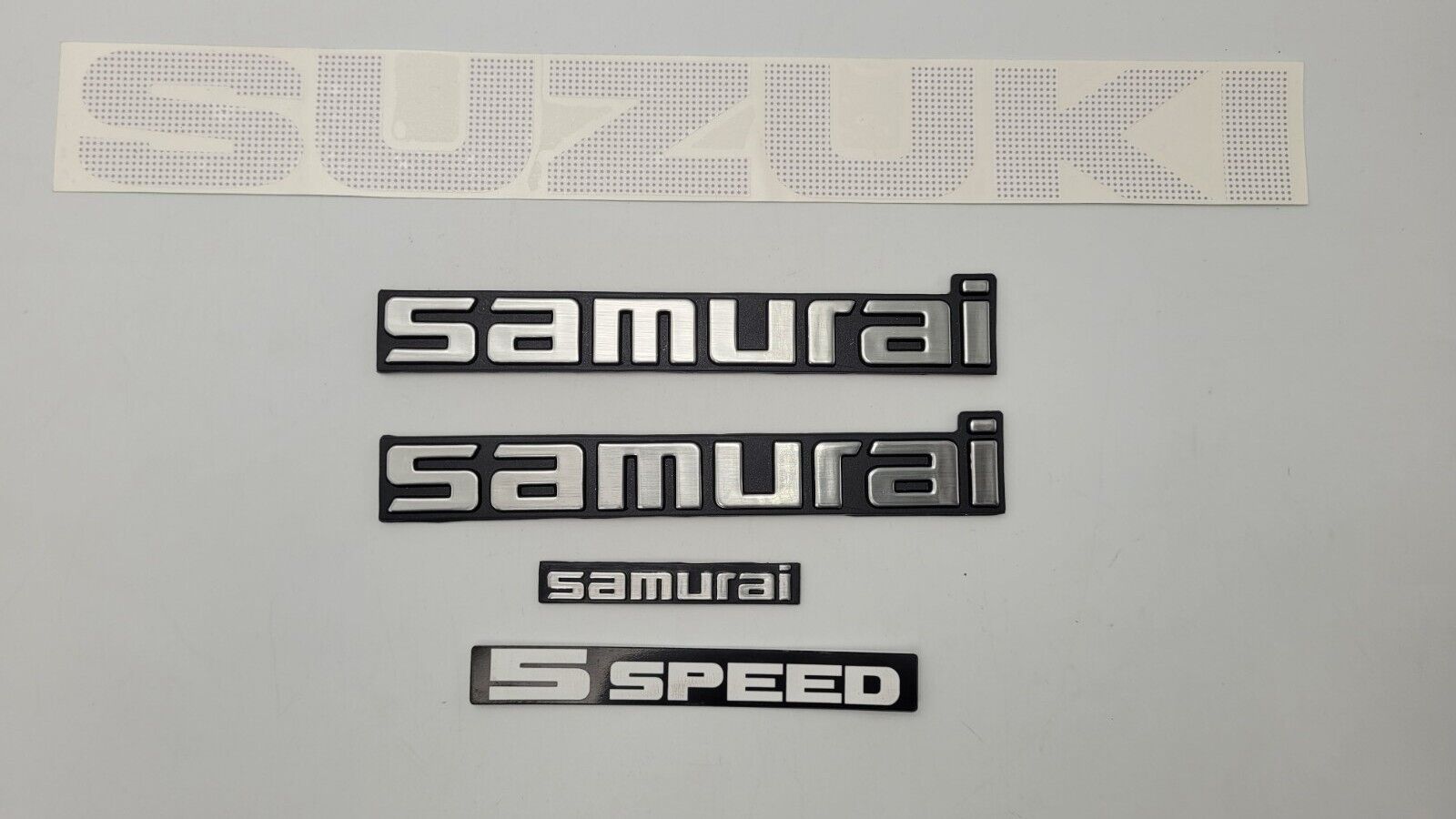 SUZUKI SAMURAI EMBLEMS AND DECALS (gray)