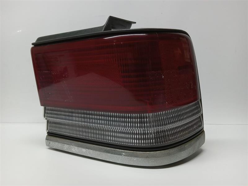 Used Right Outer Tail Light Assembly fits: 1991 Plymouth Acclaim outer quarter p
