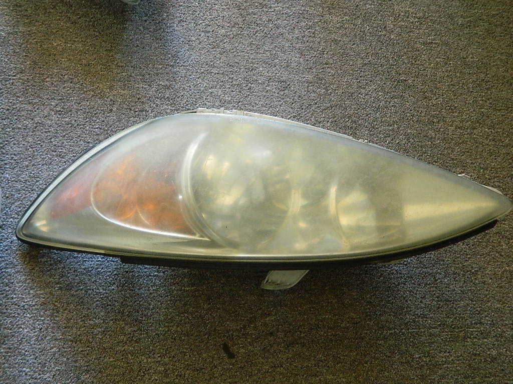 2002 2003 2004 Toyota Camry Left Head Light  OEM with bulbs