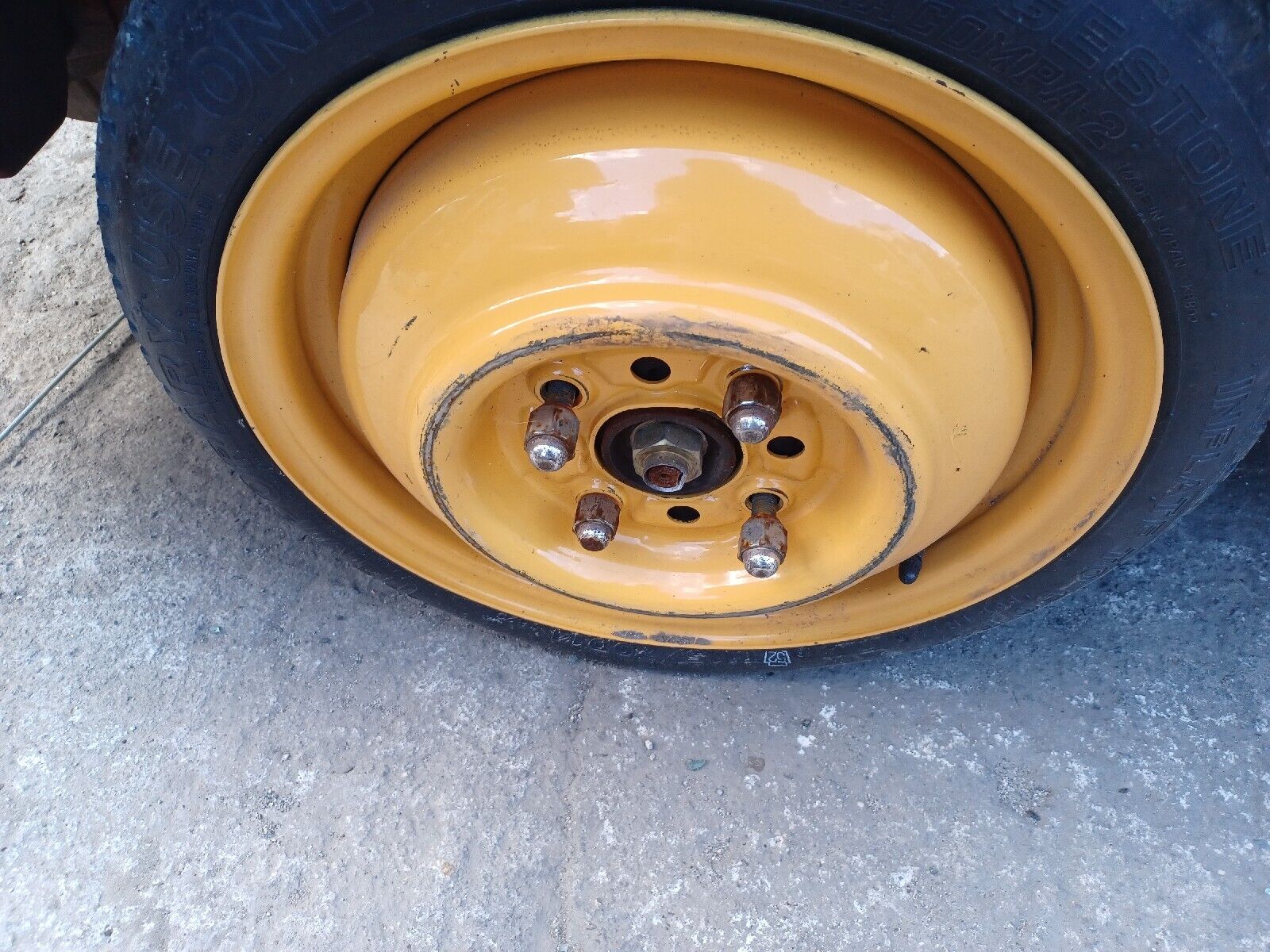 1993 GEO METRO 14 INCH COMPACT SPARE WHEEL 4 LUG USED WITH TIRE