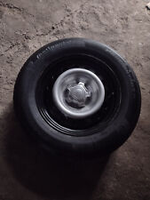 set of 4 ford maverick wheels and tires and spare tires picture